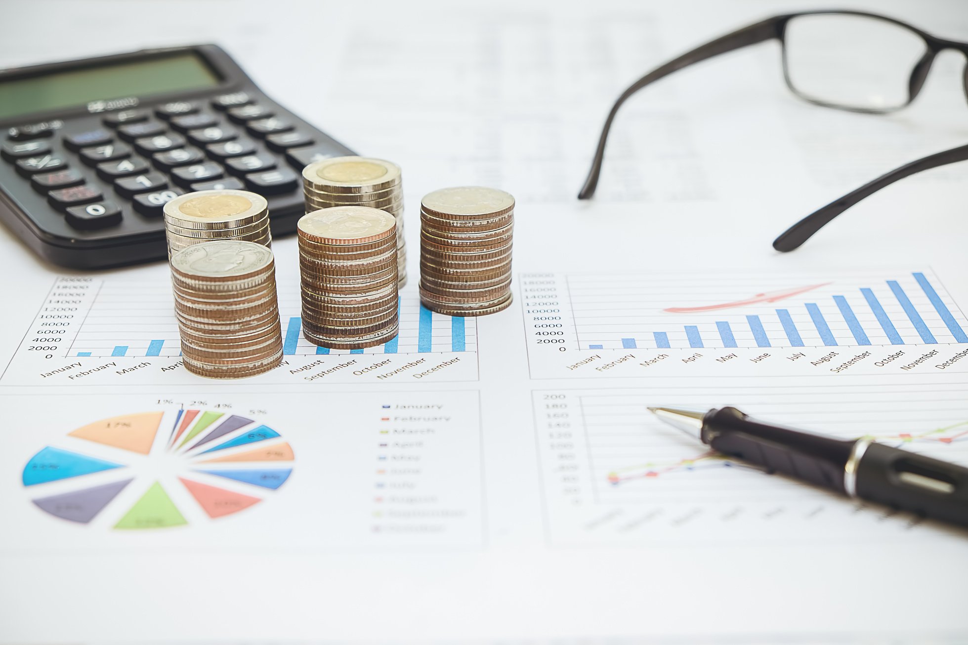 Row of Coins,Calculator with Account Book Finance 